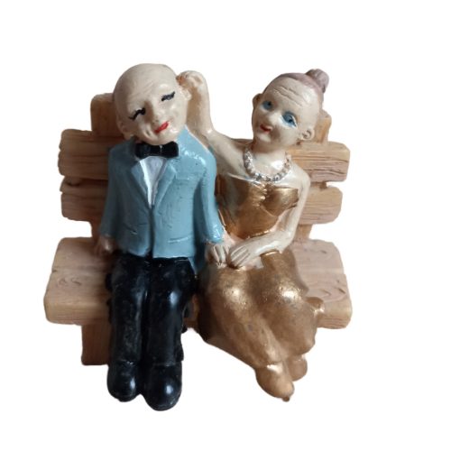 Aranylakodalmi mini tortadísz padon ülős