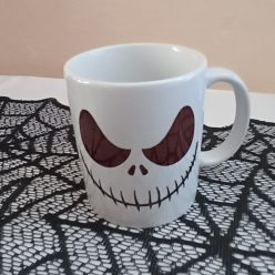Mosolygós koponya mintás kétoldalas bögre halloweenre